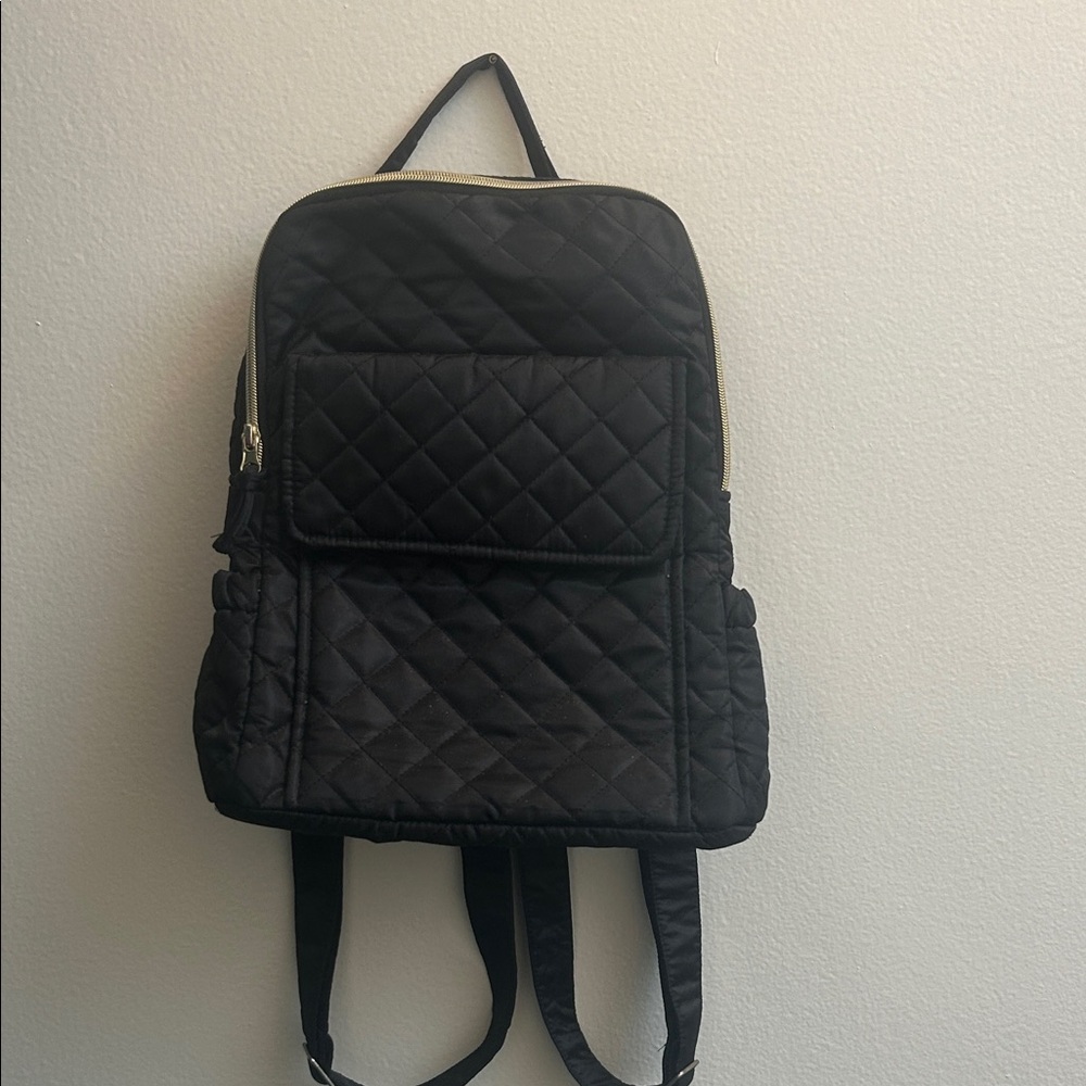 Quilted Black Backpack with golden zipper